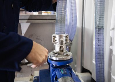 Assembly of grease trap waste consolidation hub